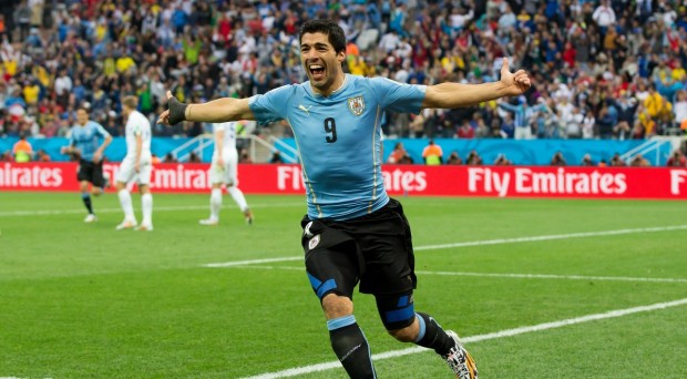 Suarez bites twice, Rooney's first WC goal was not enough